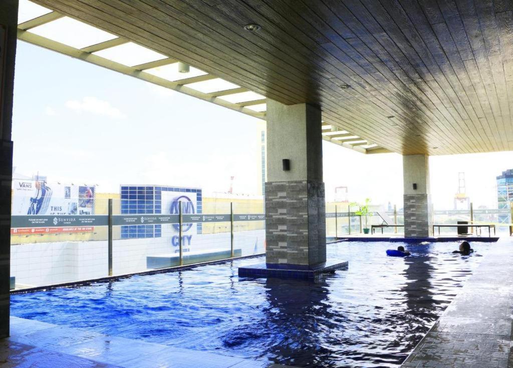 Aparthotel Joyful Hub With Netflix At Sunvida Cebu Stadt Exterior foto